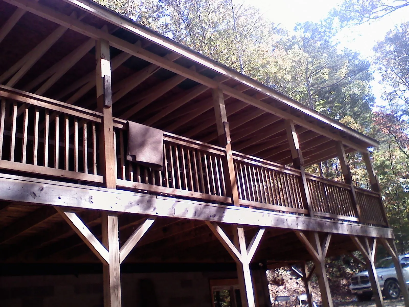 Timber framing under a new elevated porch and deck — Roof Leak Repair in Springfield Gardens by Roofing Brothers